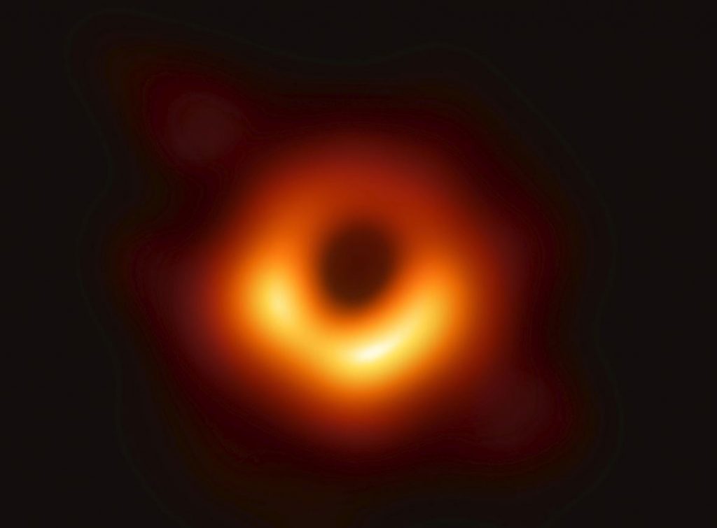 Astronomers unveil first photo of black  hole  and it s 