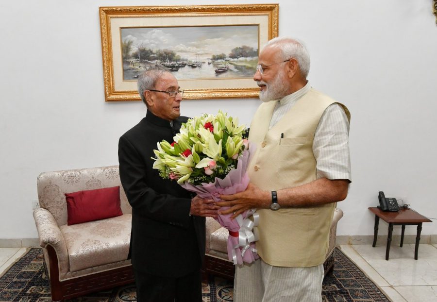 Modi meets Pranab Mukherjee to seek his blessings