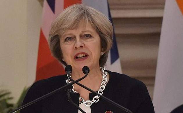 May quits as party leader, starting succession race