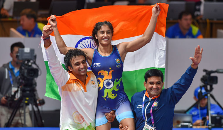 Vinesh Phogat, Wrestling, 50kg category, 53kg category, Commonwealth Games, Asian Games, Tokyo Games, Andrew Cook , World Championship, english news website, The Federal