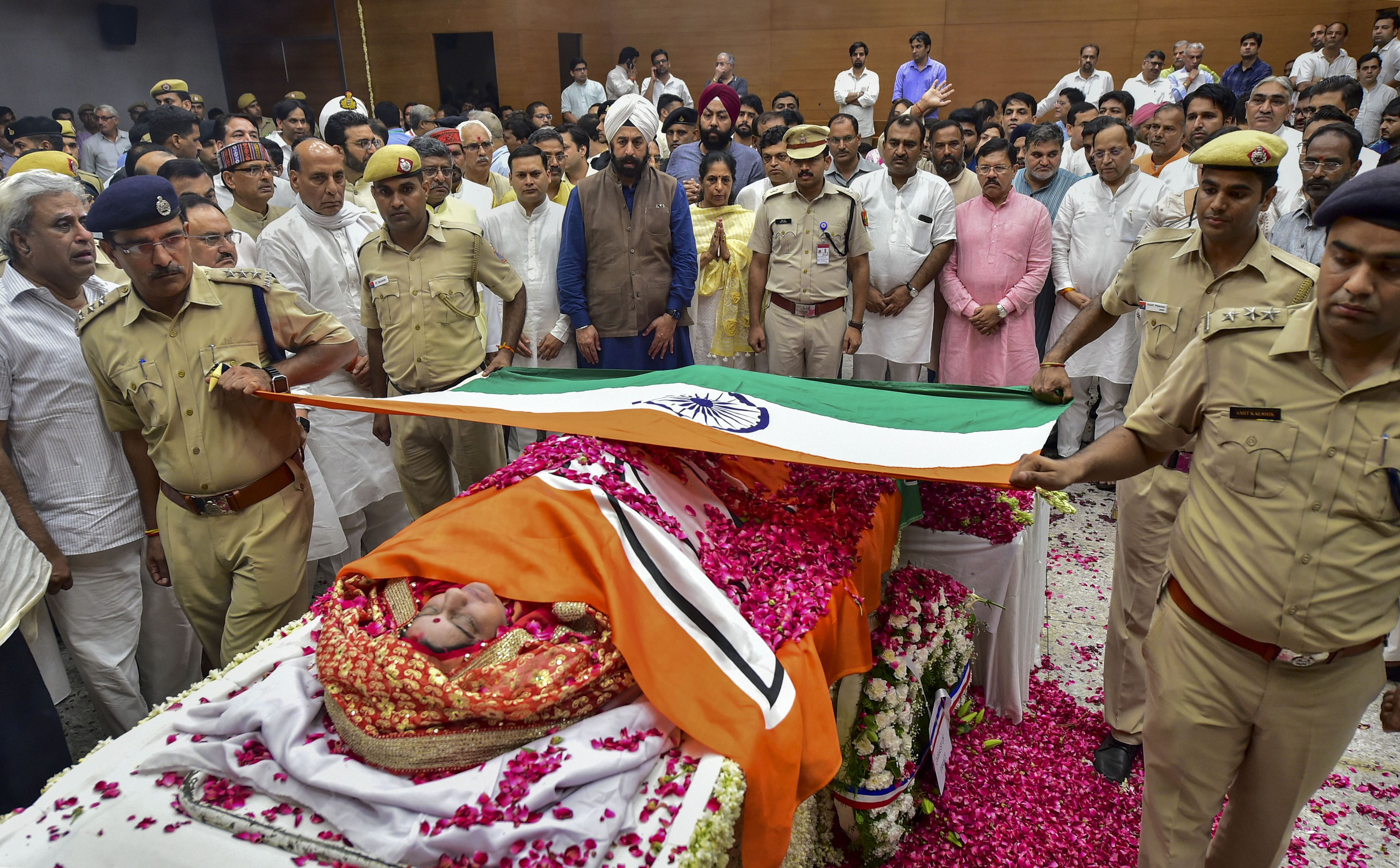 Sushma Swaraj, last rites, cremated, state honours, Prime Minister Narendra Modi, BJP president Amit Shah, leader of opposition, chief minister, The Federal, English news website