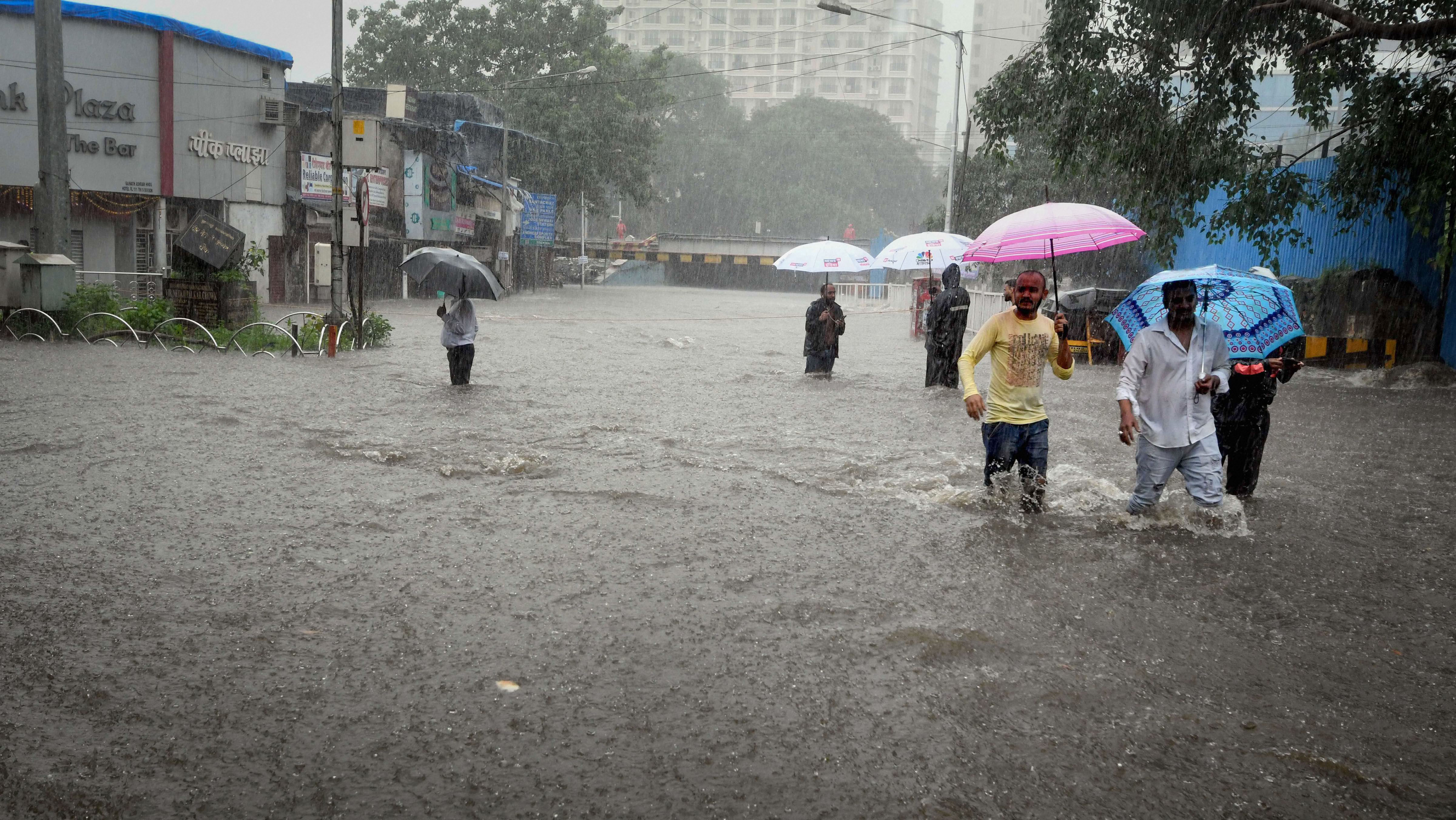 Mumbai put on red alert after heavy rains; local trains cancelled, flights delayed