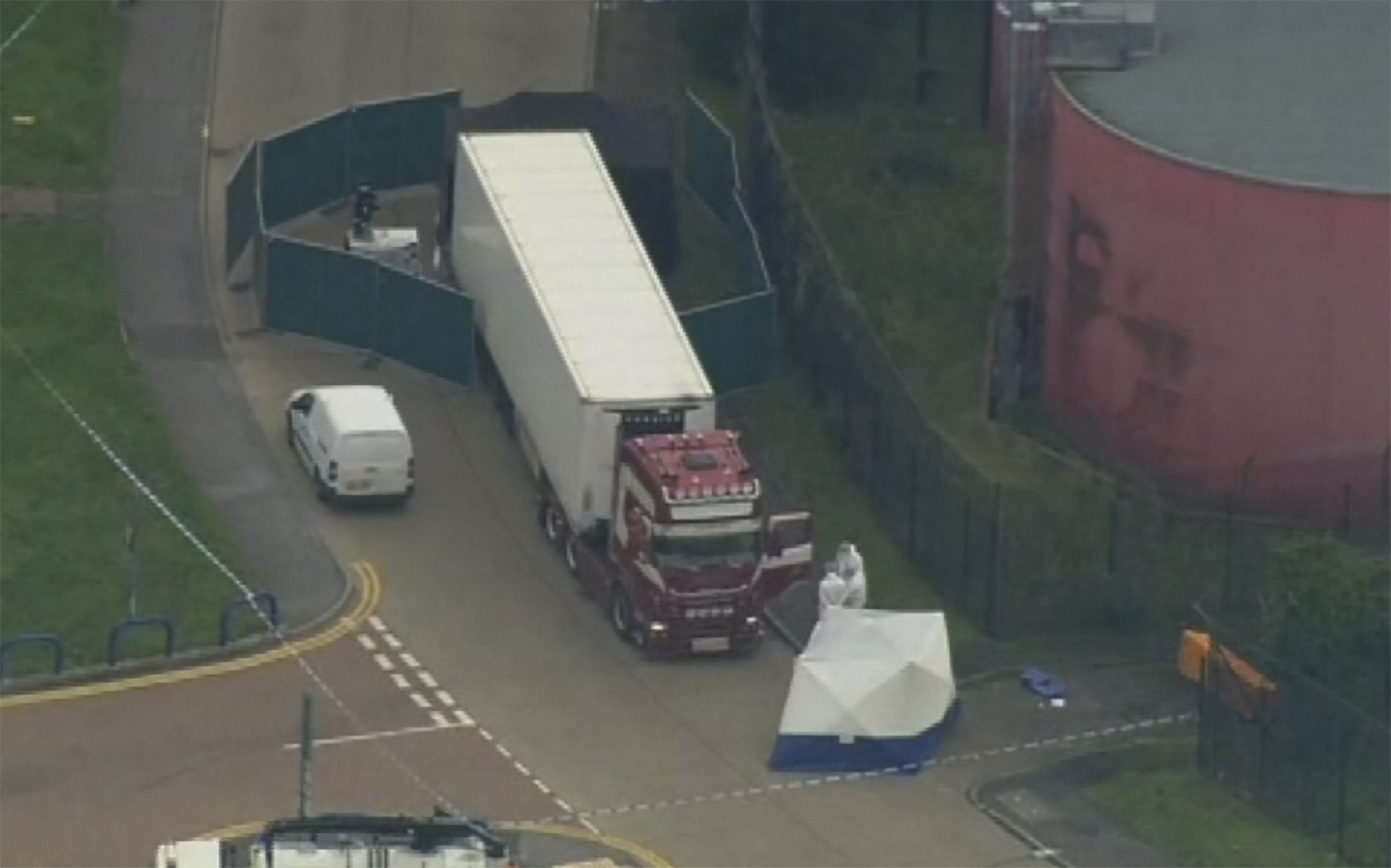 39 dead bodies found in truck container near London, driver arrested