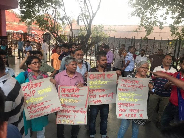 Activists. Photo: Sudipto Mondal Bangladeshi migrants, illegal immigrants, Muslims, rag pickers, garbage segregation, Bangalore, detain, police, raids, camps, tents, Kolkata, deportation, transport, activists, protests, Howrah Express, train