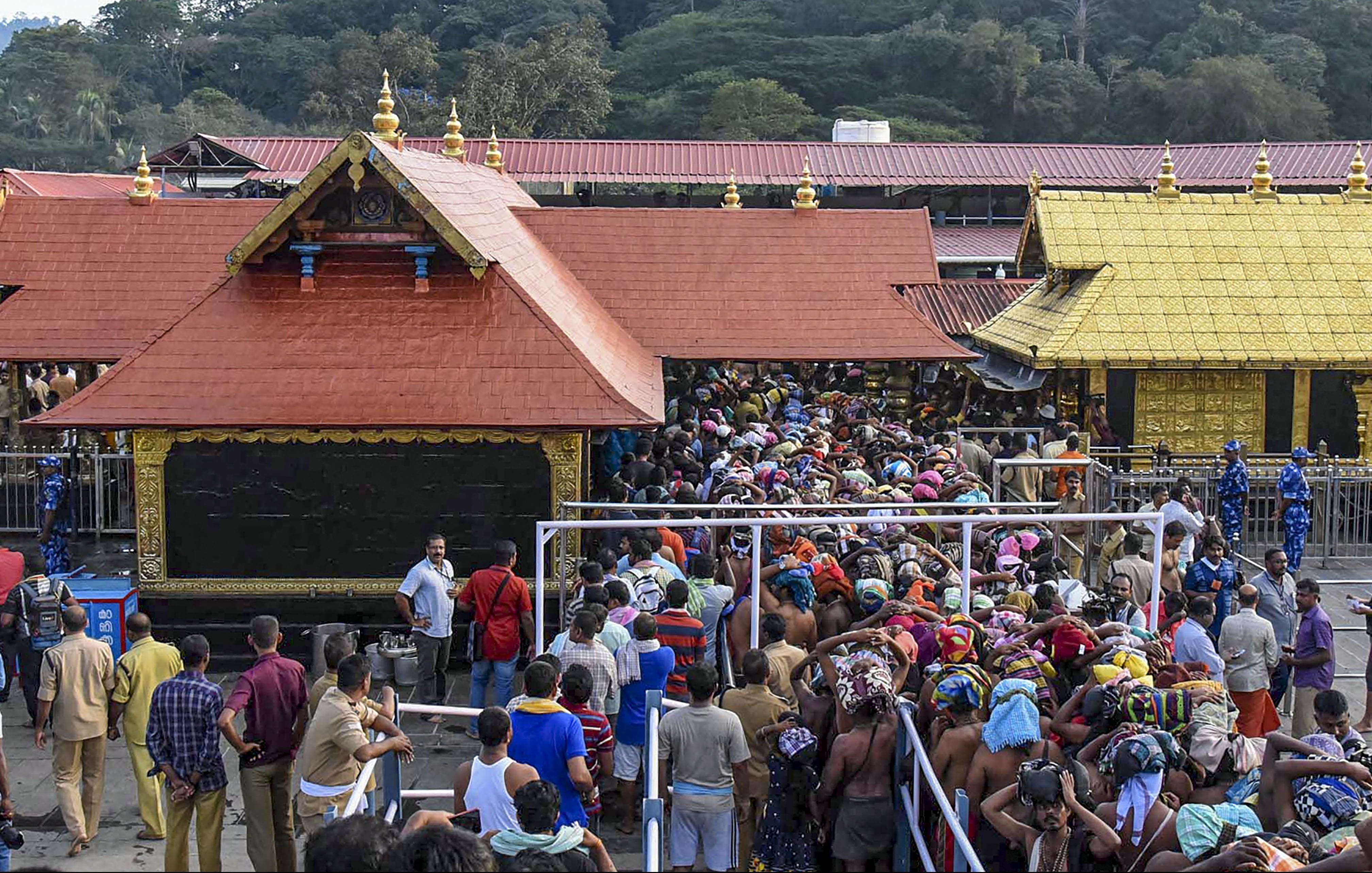 Sabarimala temple opens for pilgrimage season, 10 women sent back