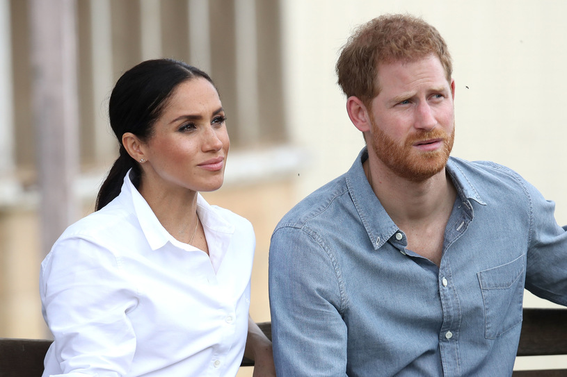 Britains Prince Harry and Meghan to give up royal titles