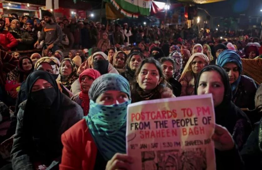 Women, children take out anti-CAA candle light march from Jamia to Shaheen Bagh