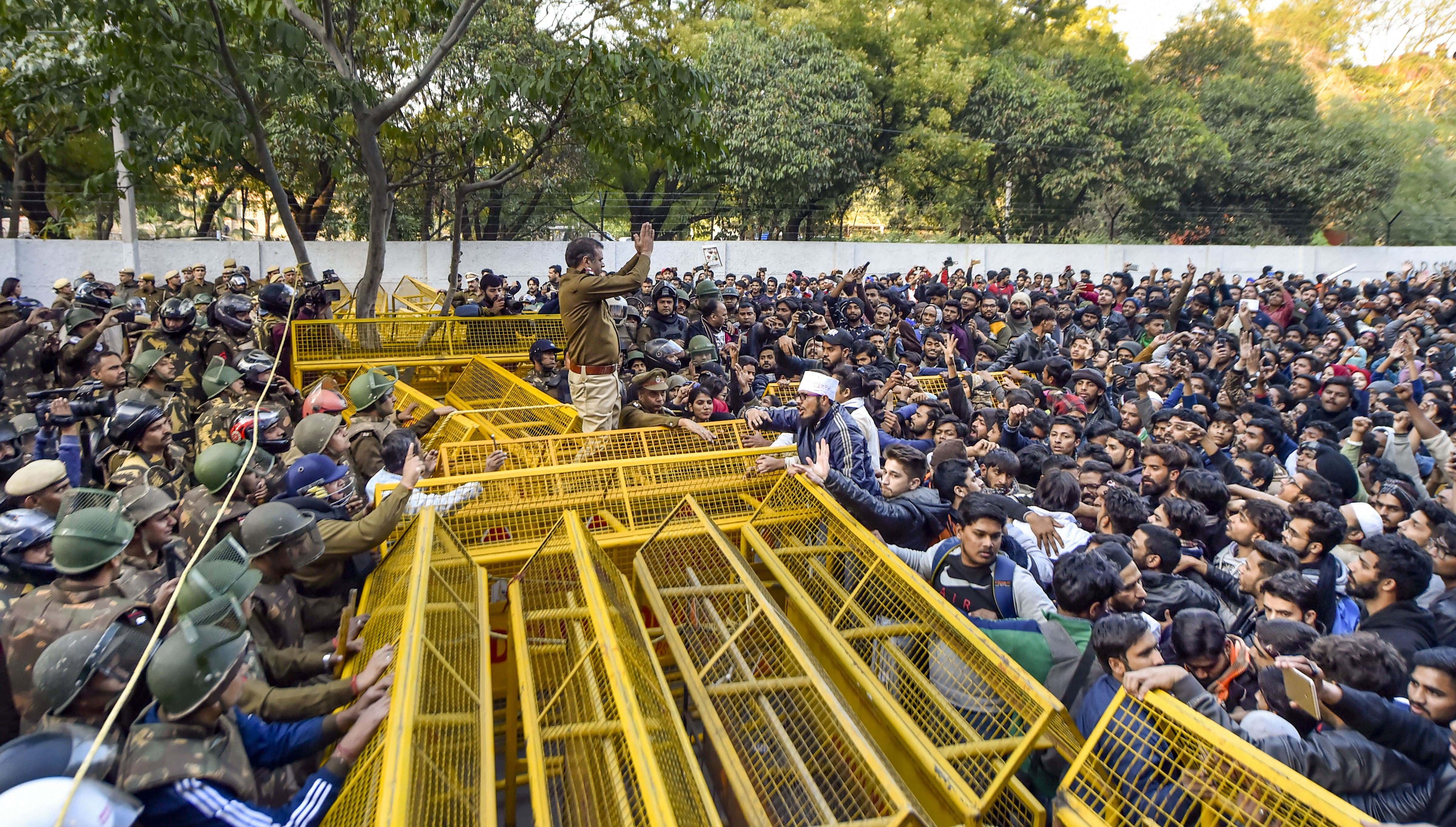 Jamia Millia Islamia students stage protest outside varsity