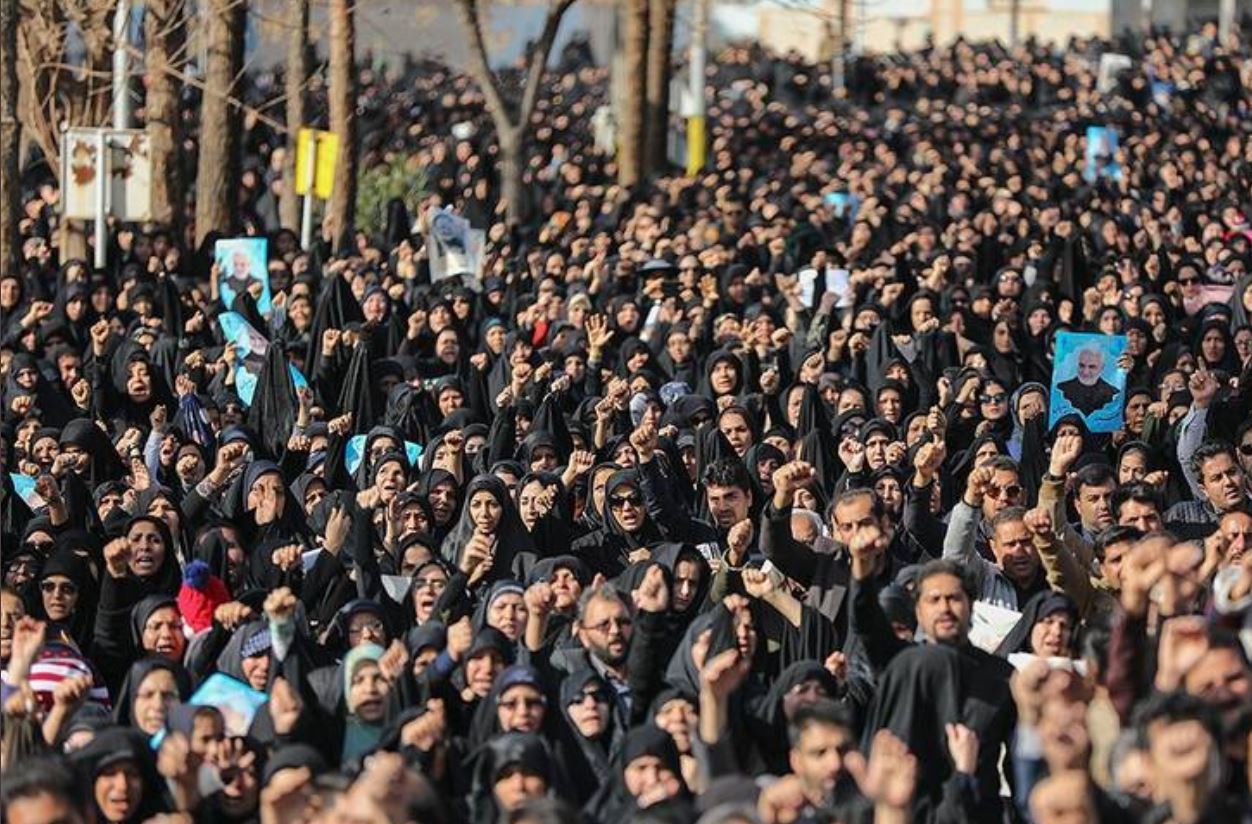 Mourners chant Death to America as Soleimanis remains arrive from Iraq