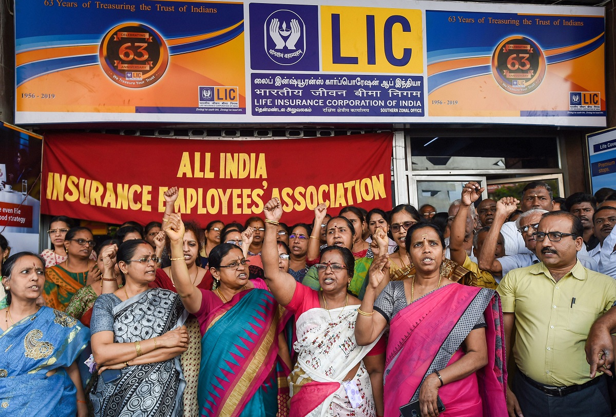 LIC employees hold walk out from offices to protest stake sale
