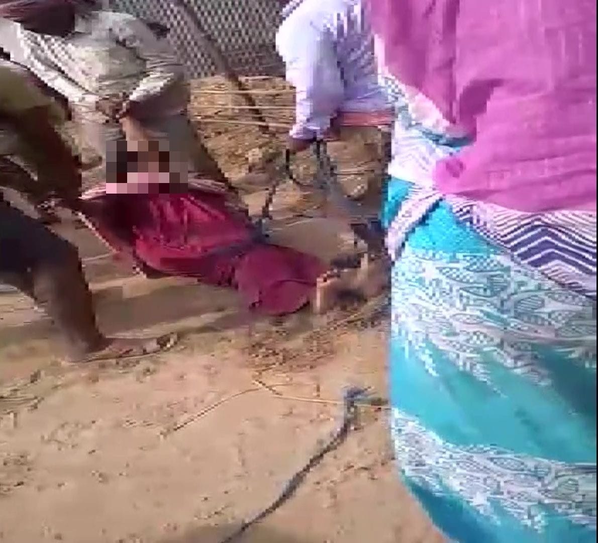TMC leaders tie lady teacher, drag her on road in Bengal village