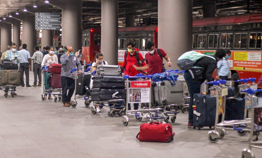 Mumbai airport, foreigners swap boarding passes