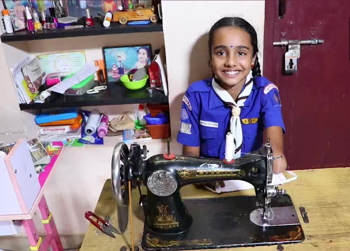 Differently-abled,10-year-old girl stitches masks for school students