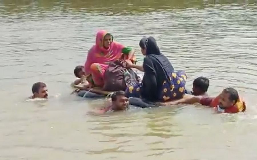 Pregnant woman taken to hospital on raft in flood-hit Bihar