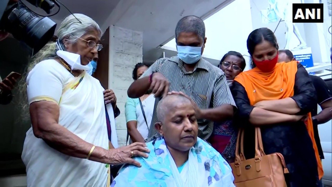 Kerala Congress woman leader publicly shaves head over denial of ticket