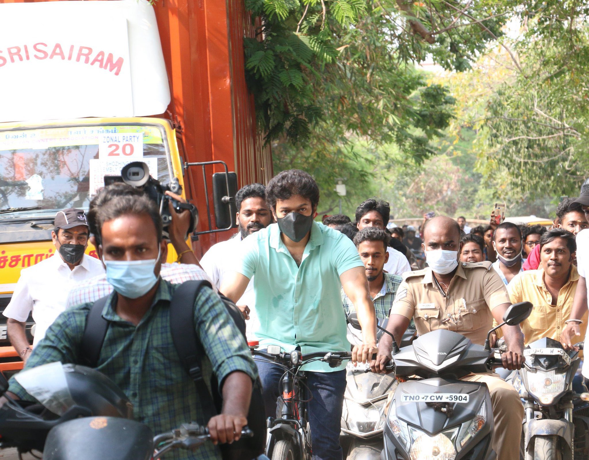Tamil actor Vijay cycles his way to polling booth in Chennai