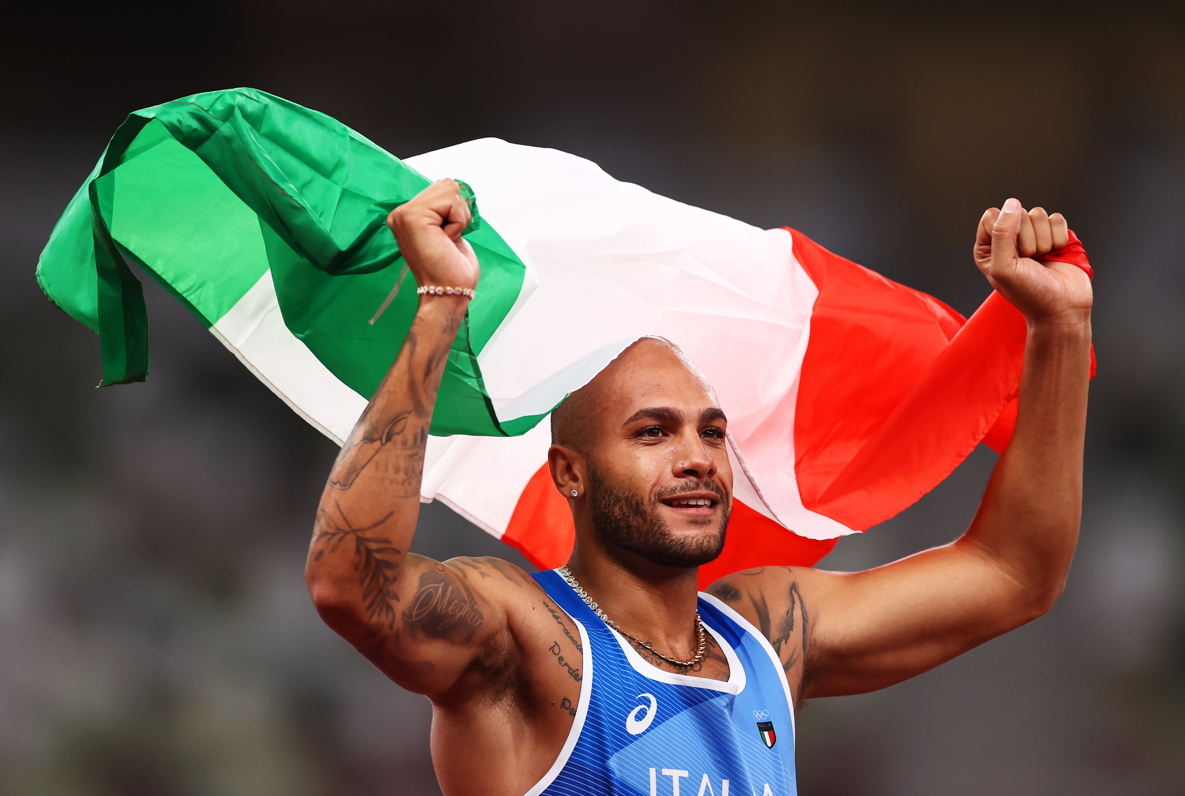 Italys Lamont Jacobs wins gold in Olympics 100m dash