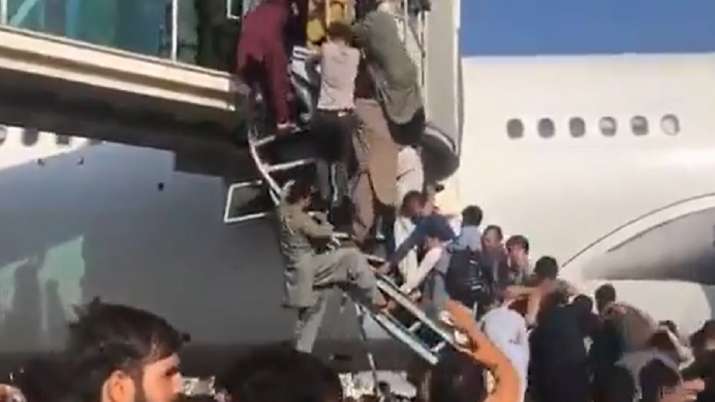 Chaos at Kabul airport as terrified Afghans try to flee Taliban