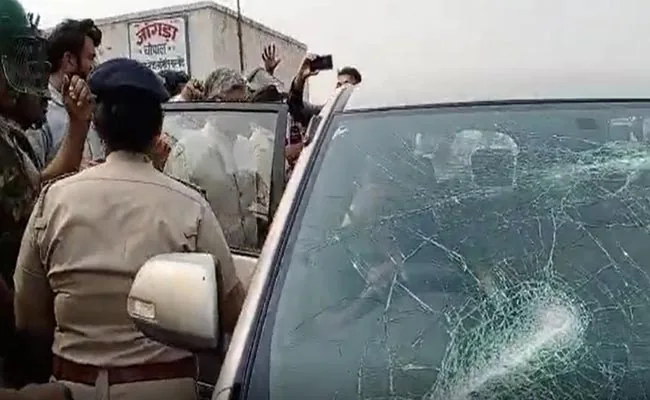 BJP MPs car windshield broken as police and farmers clash