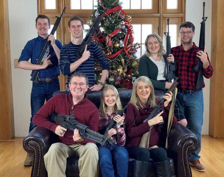 US lawmaker posts family photo with guns, days after school shooting