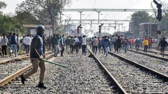 Protest against rly exam turns violent in Bihar, Centre to probe charge