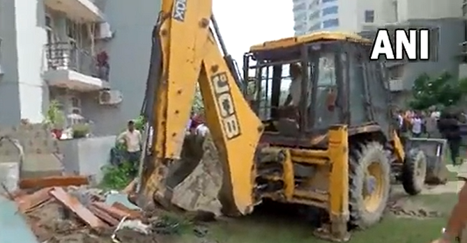 Bulldozer razes alleged BJP leader Shrikant Tyagis illegal construction in  Noida