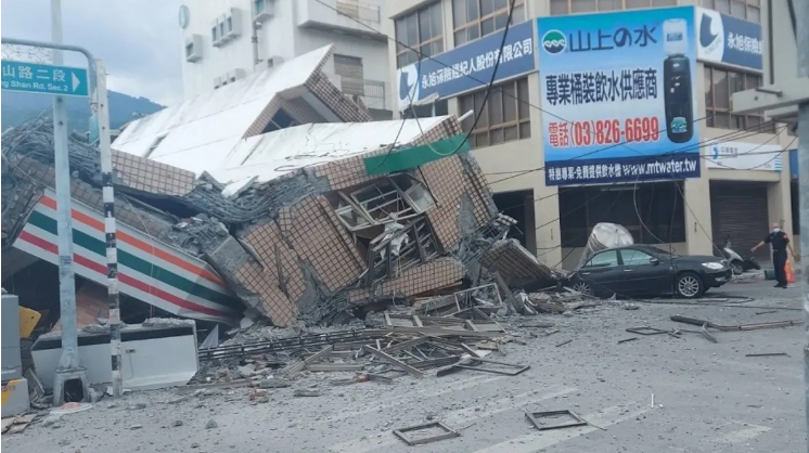 Strong earthquake kills 1, knocks house, derails train in Taiwan