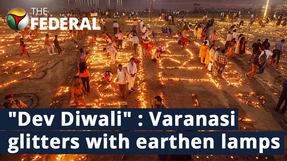 Dev Diwali: Devotees light up Varanasi with earthen lamps, take holy dip in river Ganga