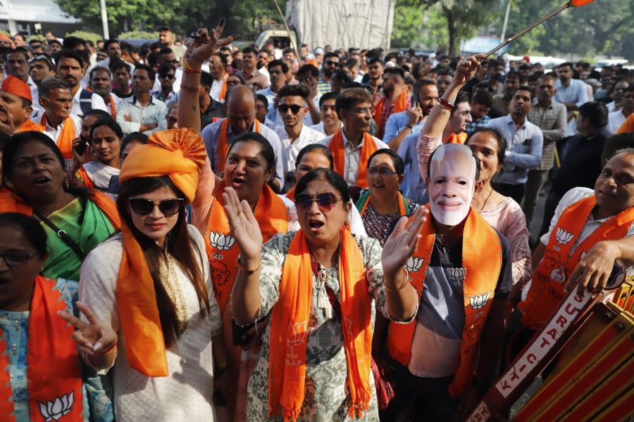 BJP beats anti-incumbency in Gujarat; suspense remains in Himachal