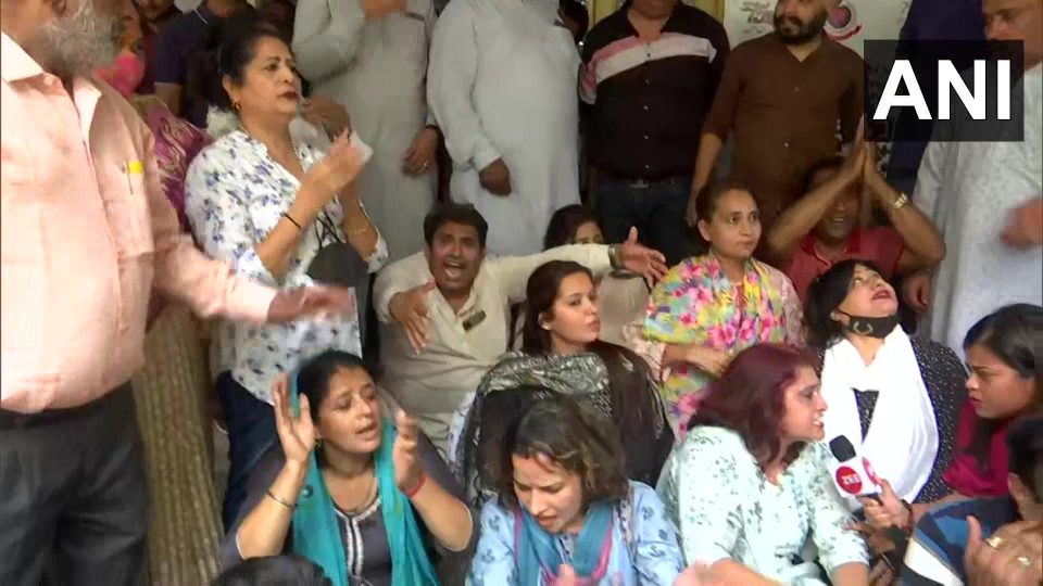 BJP demands Delhi CM Kejriwals resignation over liquor scam, stages protest