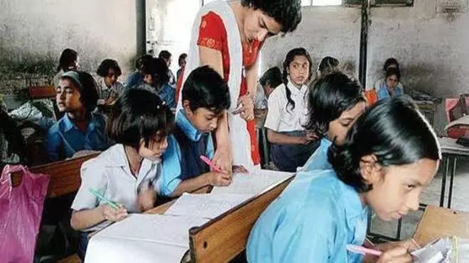 Teacher teaching in classroom