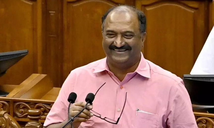 Congress legislators protest fuel cess in the Kerala assembly