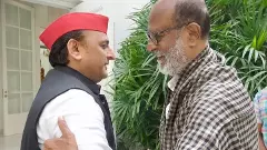 ‘When hearts meet’: Akhilesh’s hug and tweet after Rajini touches Yogi’s feet