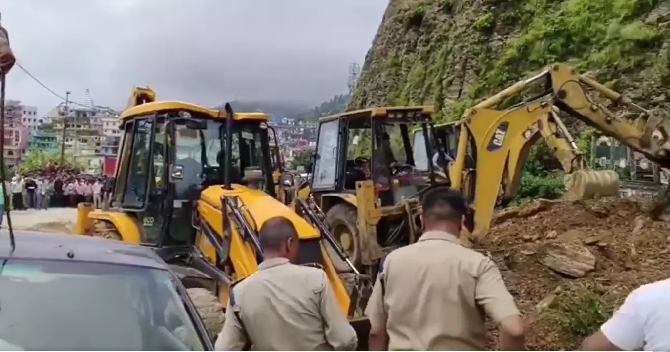 The State Disaster Relief Force has deployed excavator machines to carry out search and rescue. (Pic: ANI)