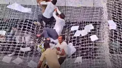 Farmers seeking adequate land compensation jump on safety nets at Mumbais Mantralaya