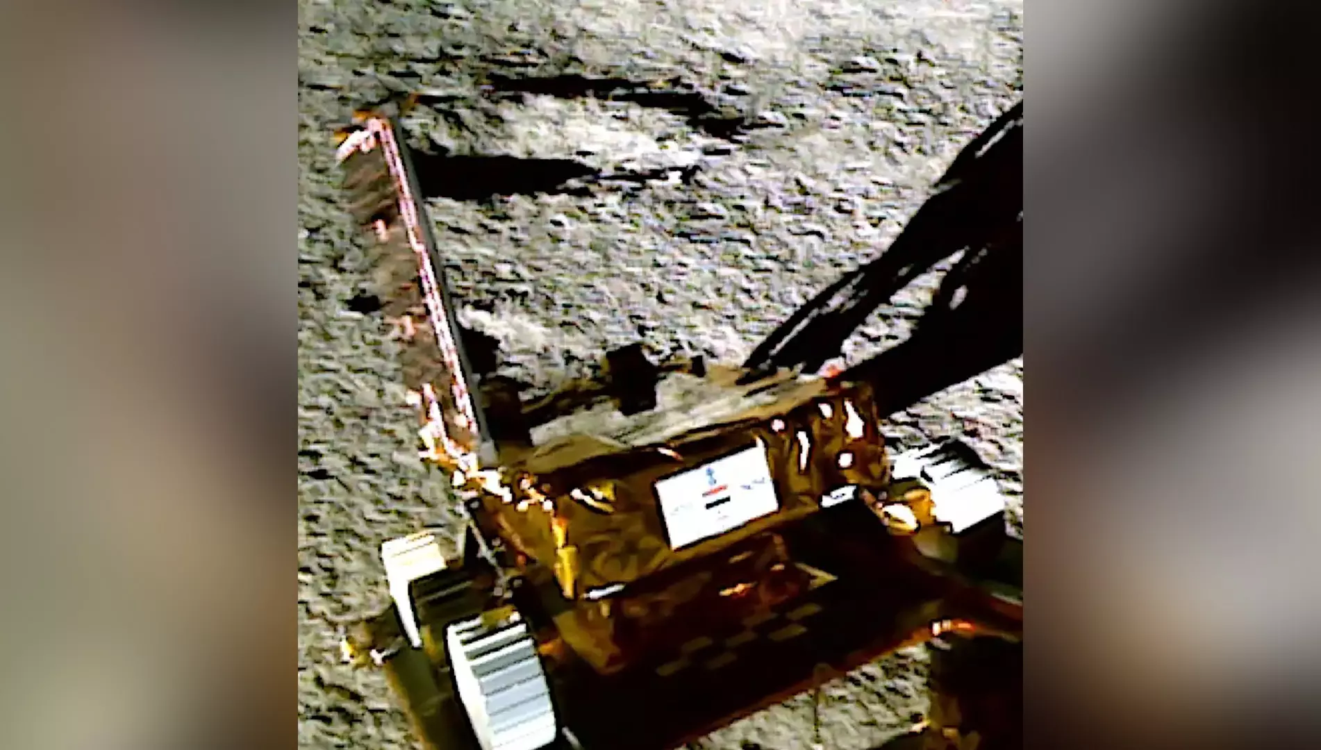 In this image taken by one of the LI Camera, the Pragyan is colourful, but the lunar surface appears black and white.
