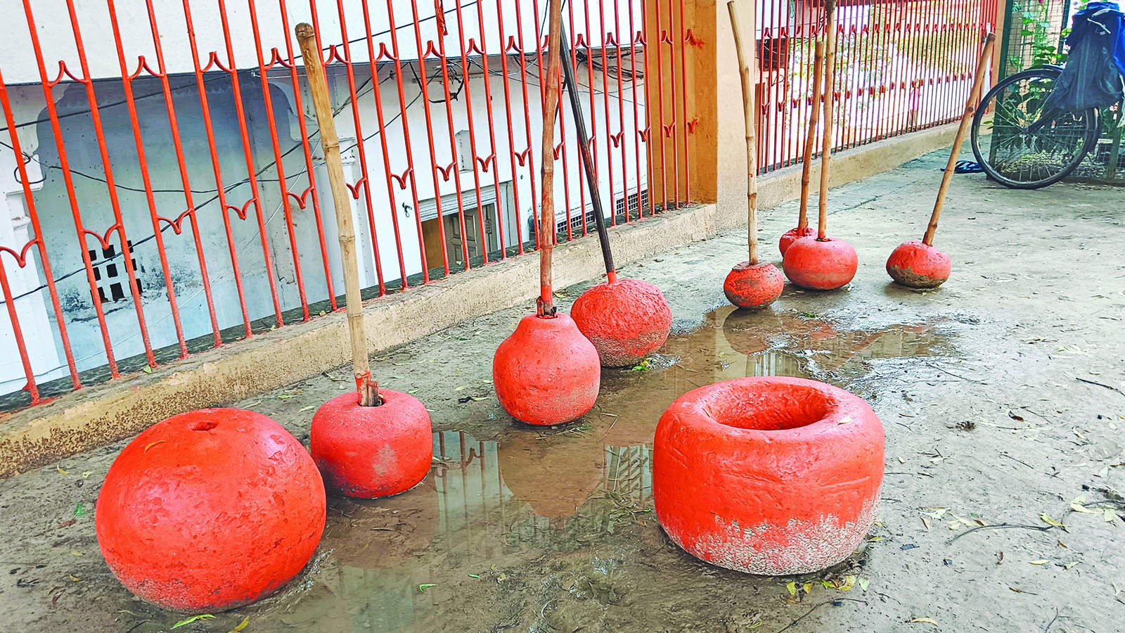 Naal gada and other traditional stone weights for wrestlers.