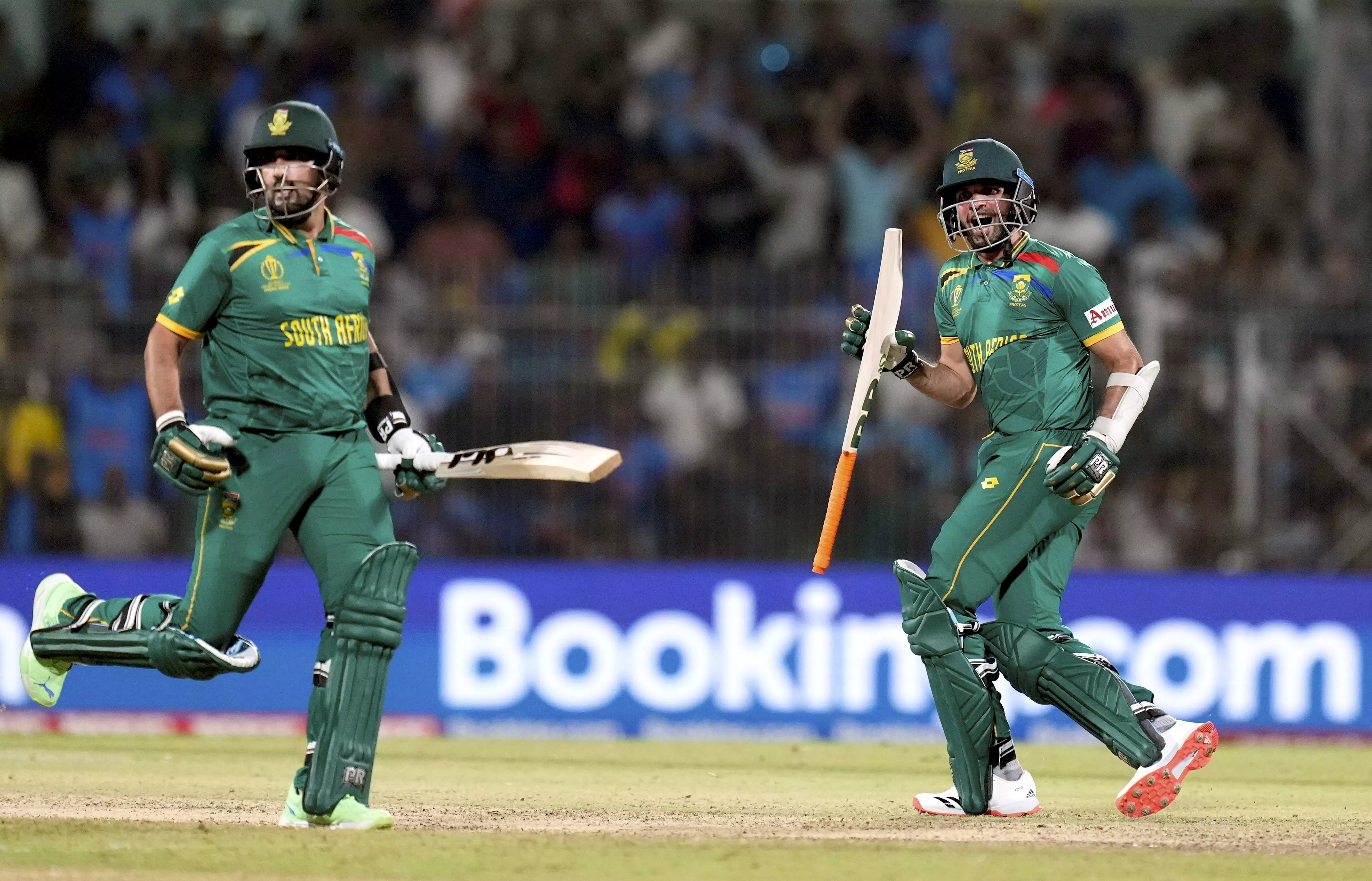 South Africas batters Keshav Maharaj (right) and Tabraiz Shamsi celebrate after winning the ICC Mens Cricket World Cup 2023 match against Pakistan, at MA Chidambaram Stadium, in Chennai, Friday, October 27. Photo: PTI