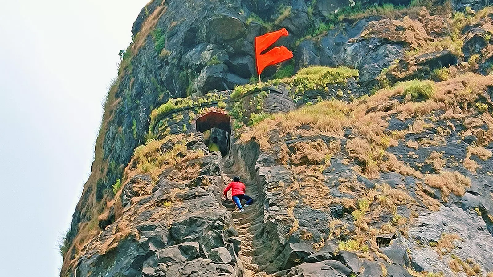 What’s driving people to scale the 80-degree inclined rock steps of Harihar Fort