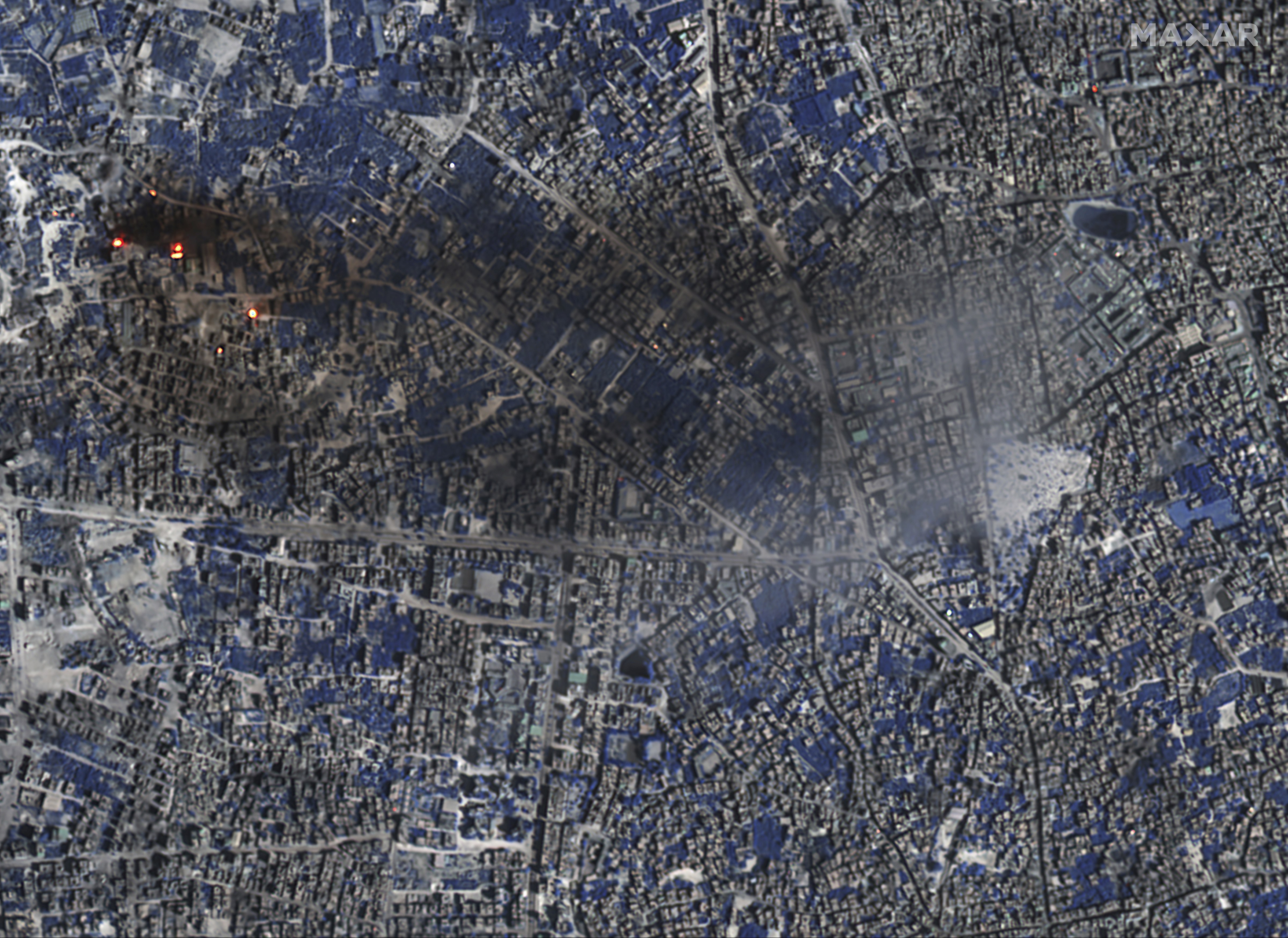 Satellite photos show a burning Gaza Satellite photos show a burning Gaza