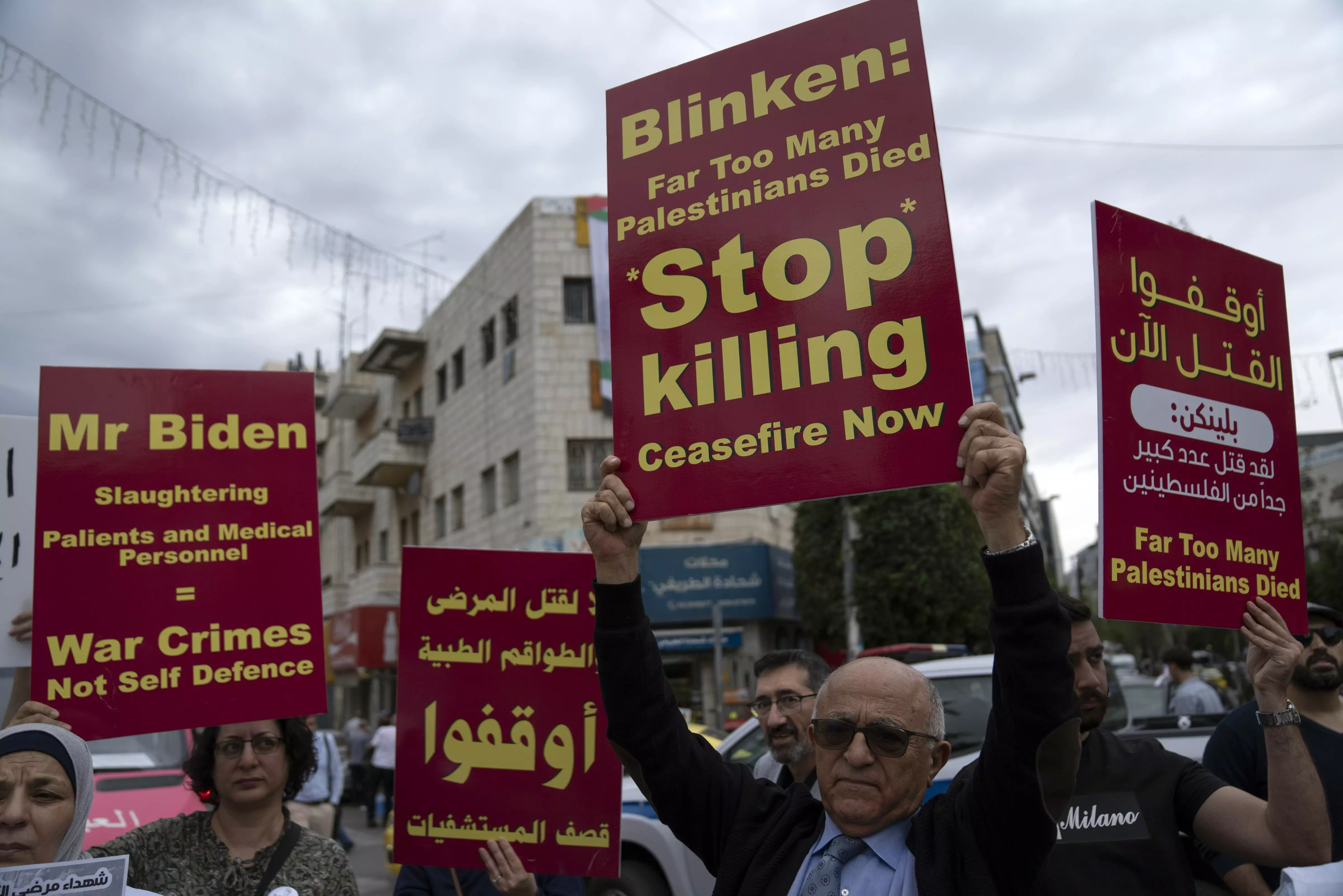 Members of the Palestinian health sector take part in a rally to protest the collapse of the Palestinian health services in Gaza, in the West Bank city of Ramallah, on November 12 | AP/PTI