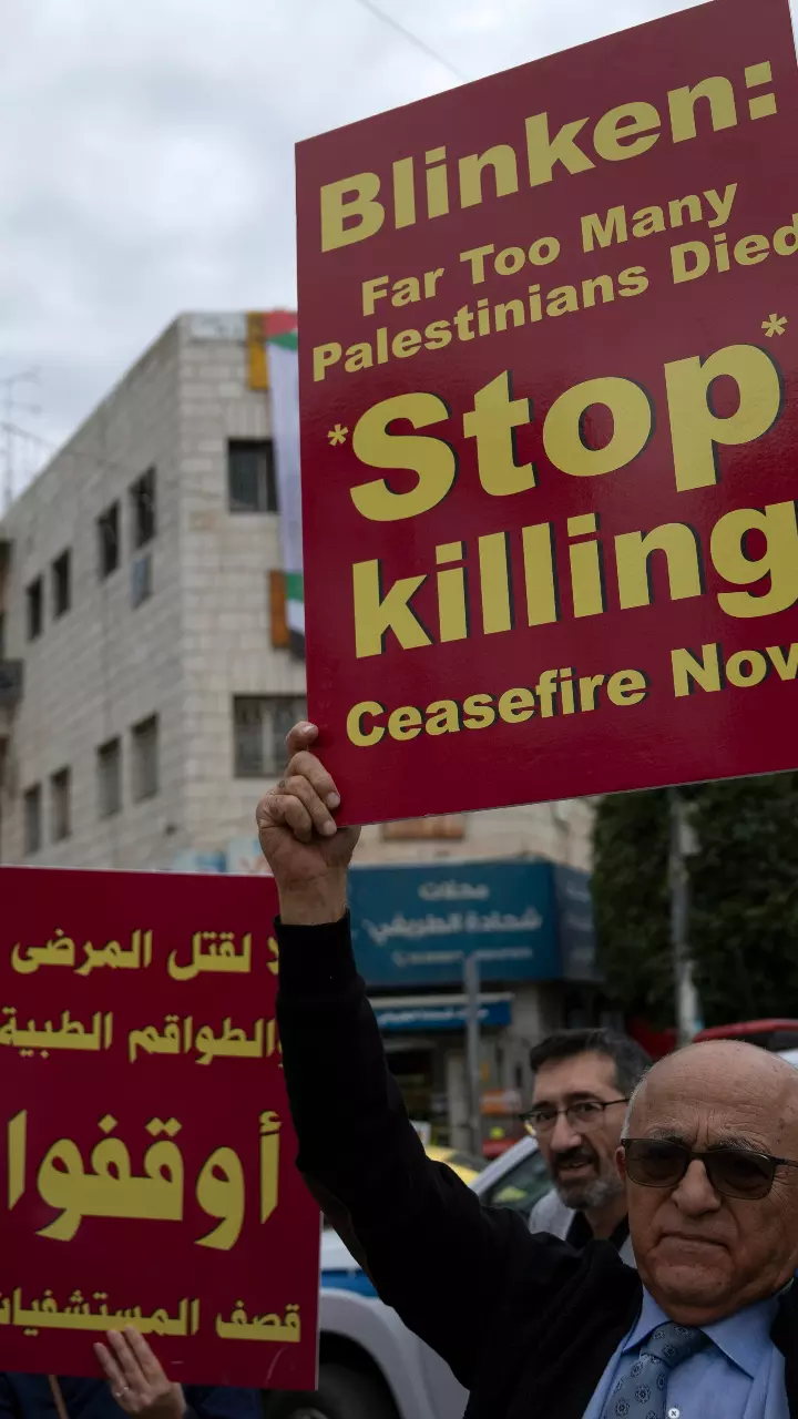 Members of the Palestinian health sector take part in a rally to protest the collapse of the Palestinian health services in Gaza, in the West Bank city of Ramallah, on November 12 | AP/PTI Members of the Palestinian health sector take part in a rally to protest the collapse of the Palestinian health services in Gaza, in the West Bank city of Ramallah, on November 12 | AP/PTI