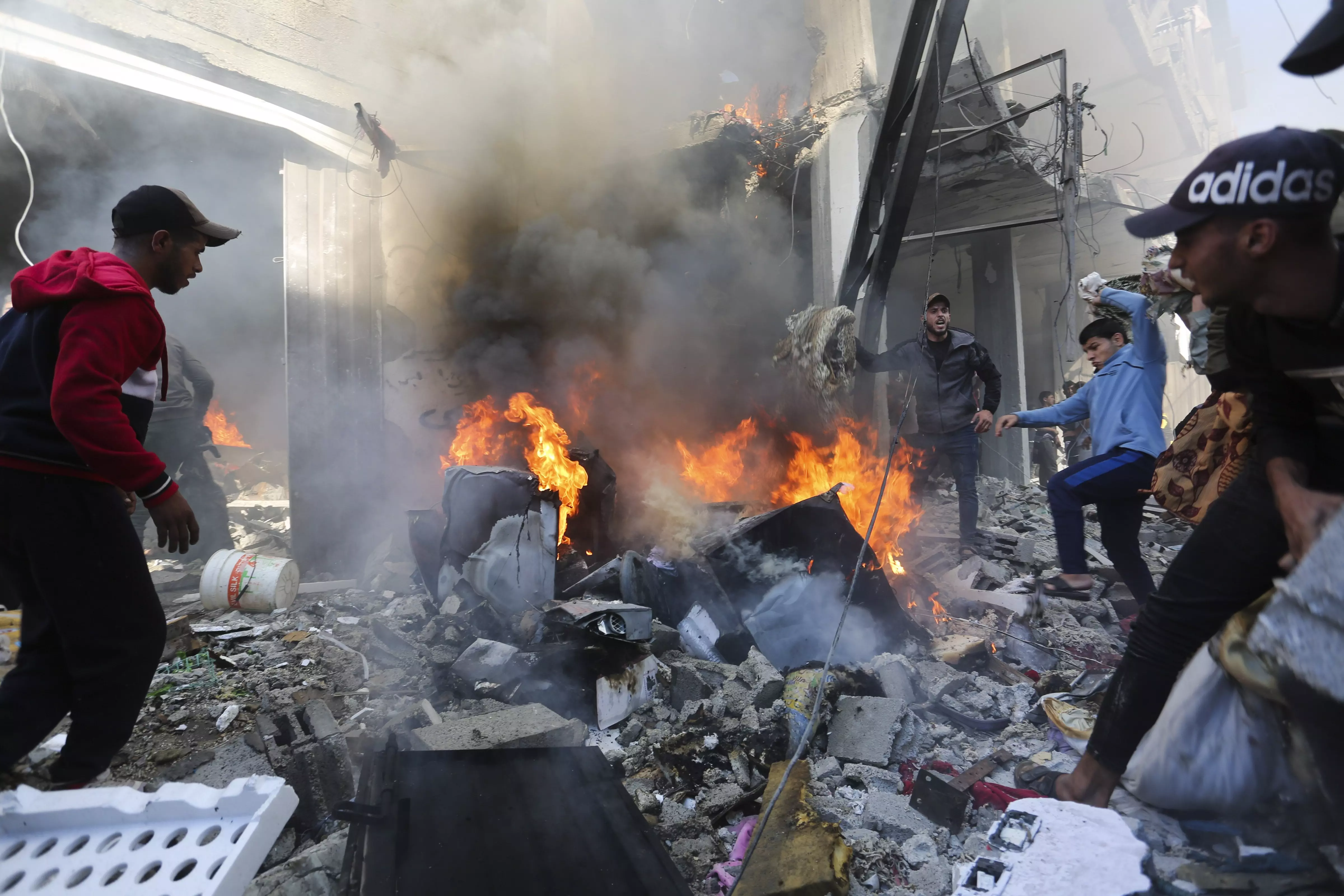 Palestinians look for survivors after an Israeli strike on Rafah, Gaza Strip | AP/PTI