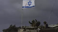 Israel battles Hamas near another Gaza hospital sheltering thousands