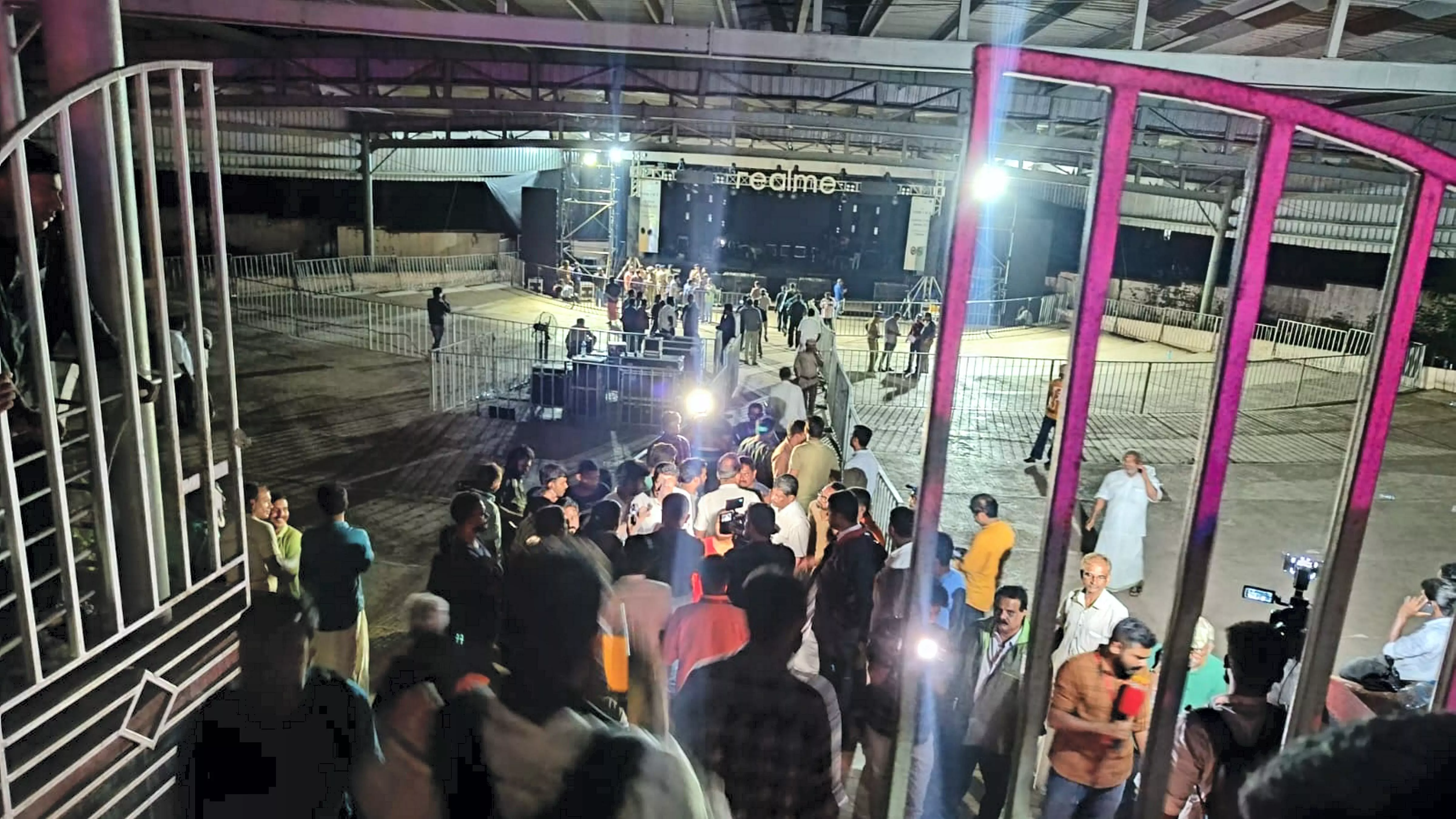 People gather near the spot at Cochin University where the stampede happened. PTI Photo