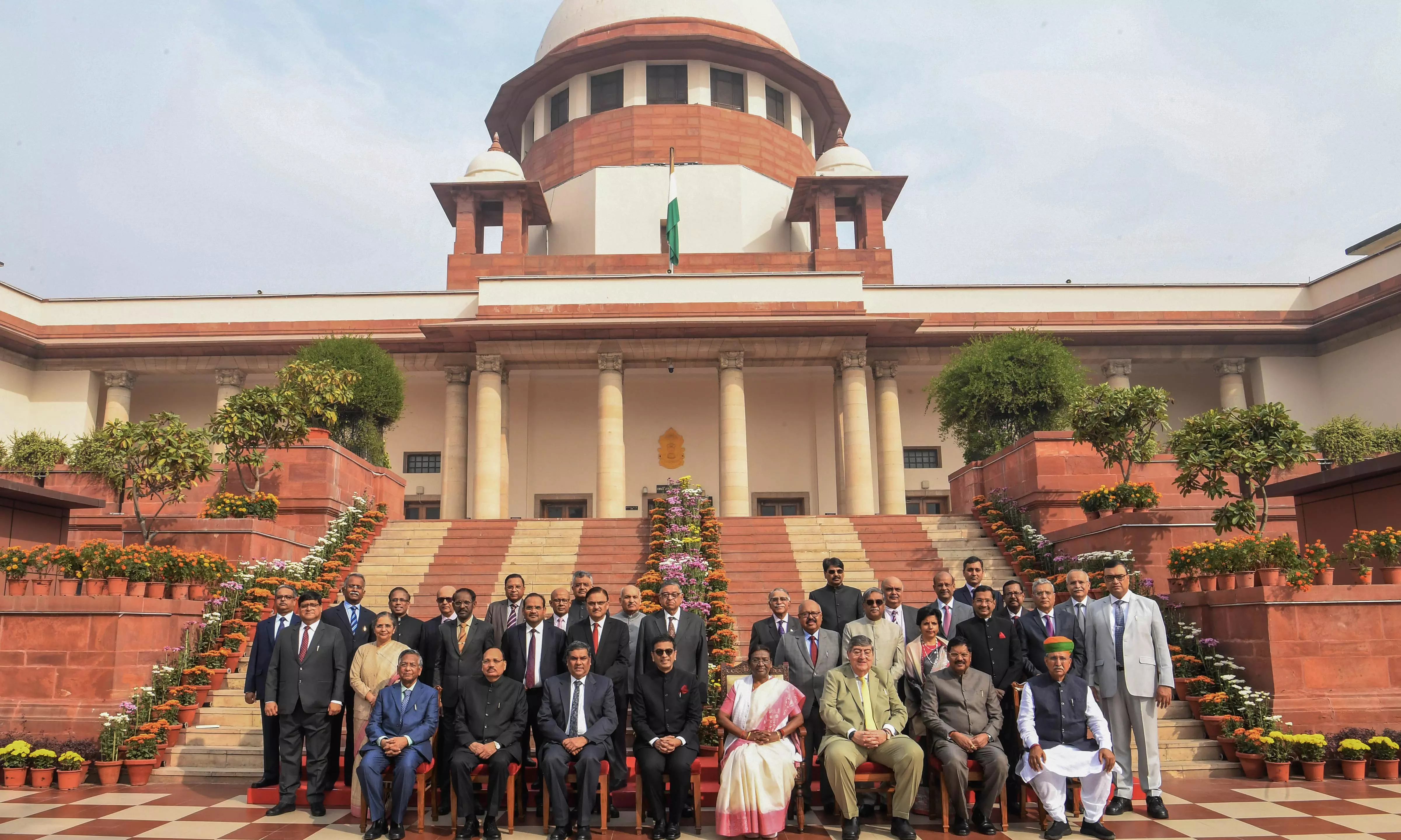 President Droupadi Murmu in a group photo with CJI DY Chandrachud and others during Constitution Day celebrations organised by the Supreme Court of India on November 26 | PTI