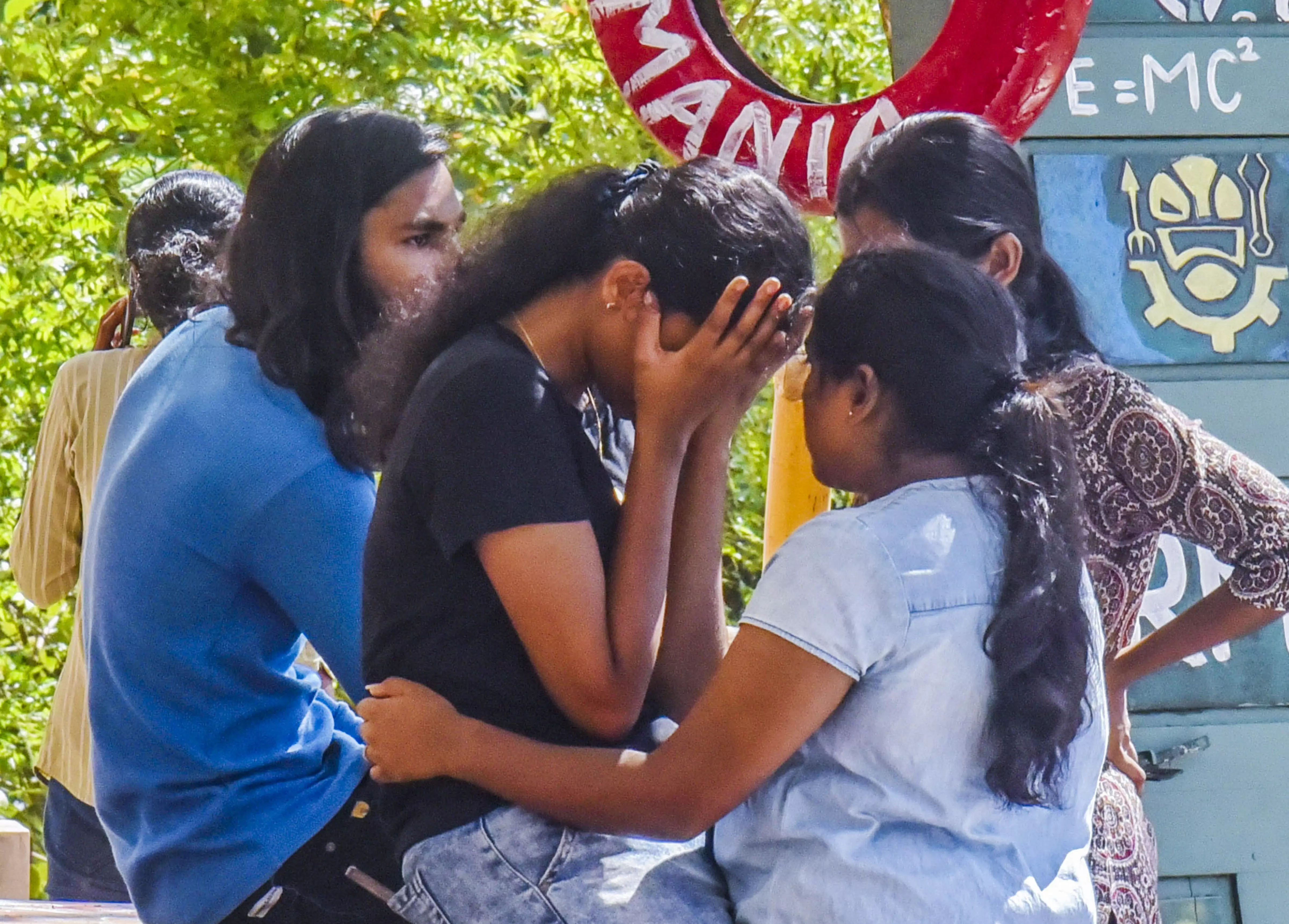 Bereaved classmates of the three students who died after a stampede during the annual festival of CUSAT | PTI