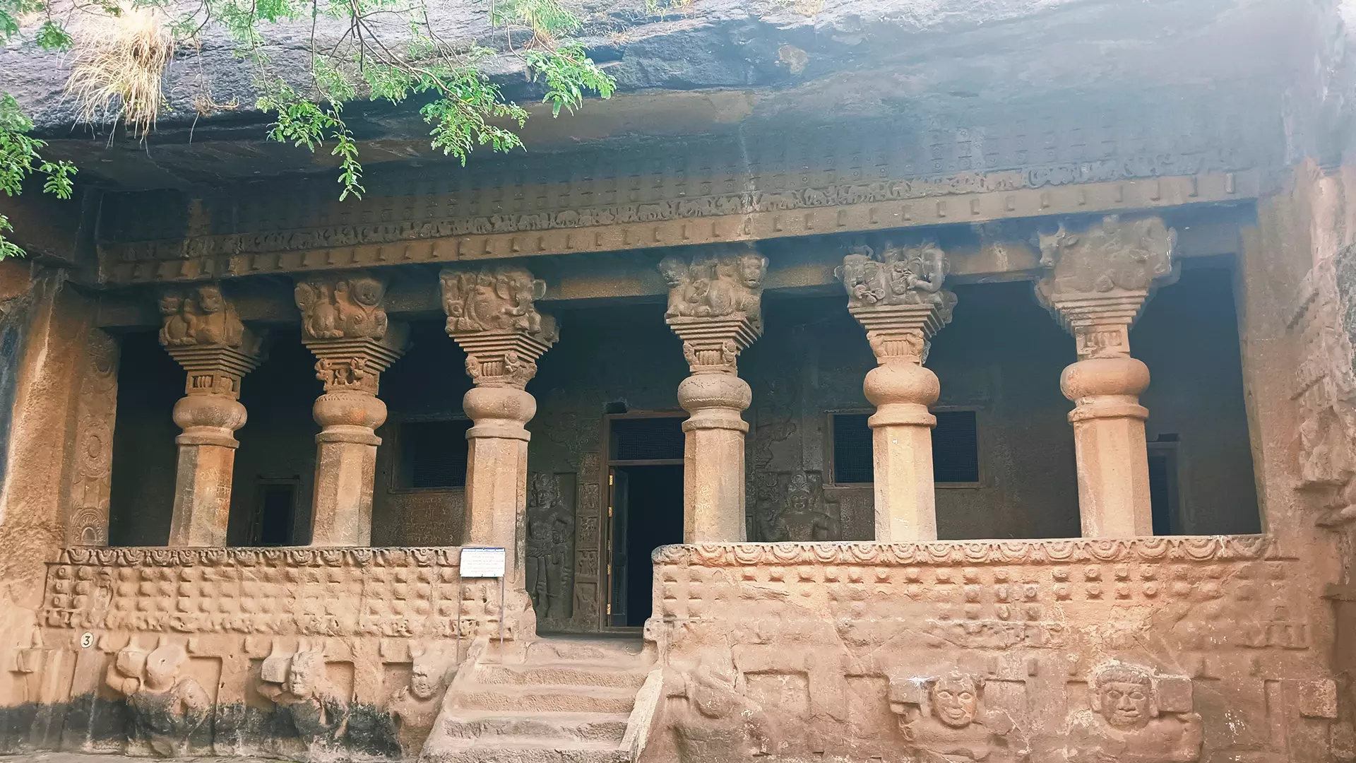 The group of 25 caves, locally known as Pandav Lena, were cut in a long line on the north face of the Trirashmi hill. 