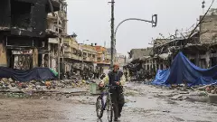 A Palestinian walks in Gaza City on November 27, the fourth day of the temporary ceasefire between Hamas and Israel | AP/PTI