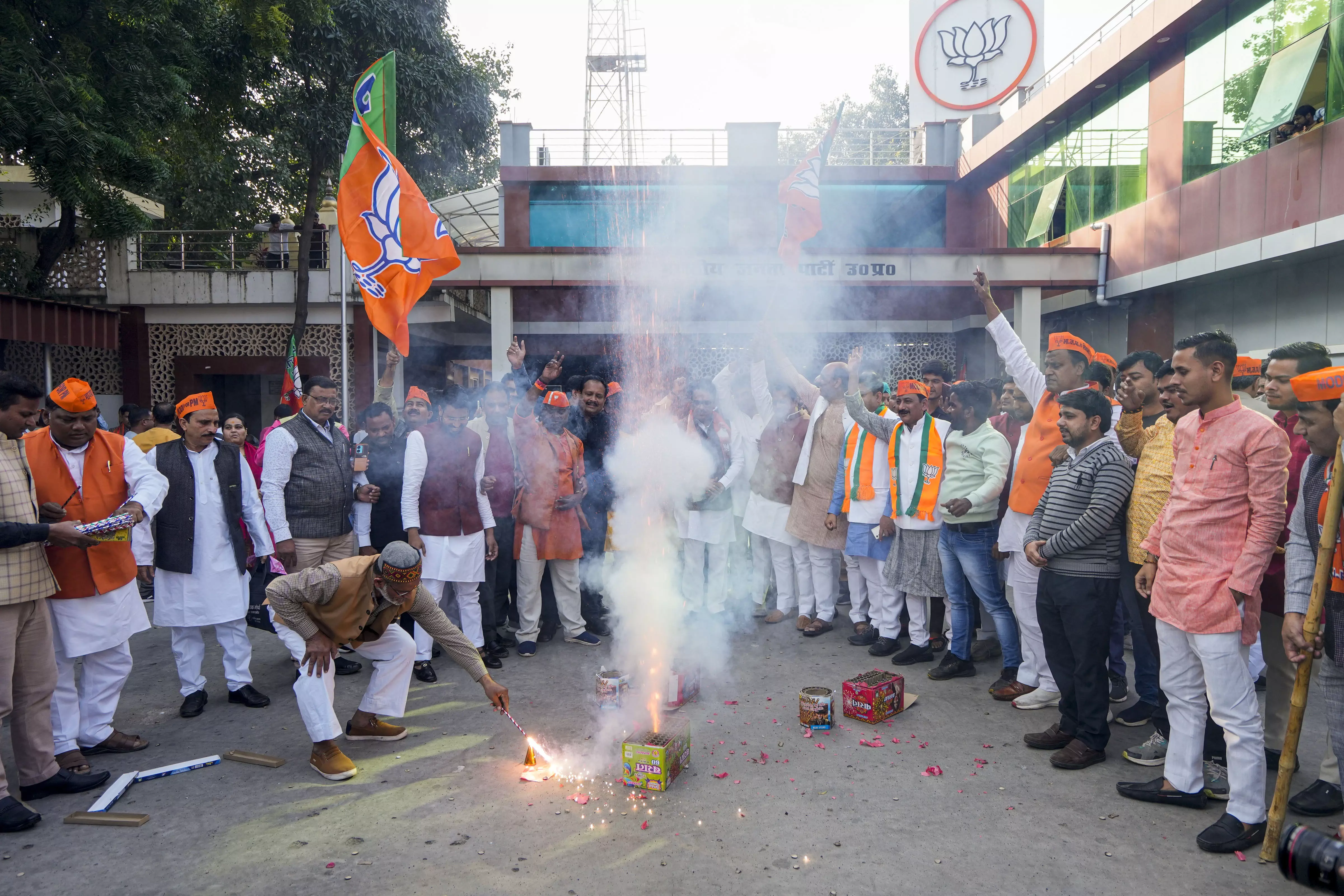 BJP supporters celebrating the partys lead in Chhattisgarh, Madhya Pradesh, and Rajasthan during counting of votes on December 3. Photo: PTI